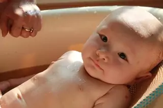 Baby relaxing in bath