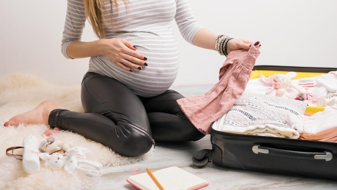 Pregnant mom packing for hospital