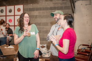 Owner, Emily Pelton, laughs alongside clients of Doulas of Baltimore.