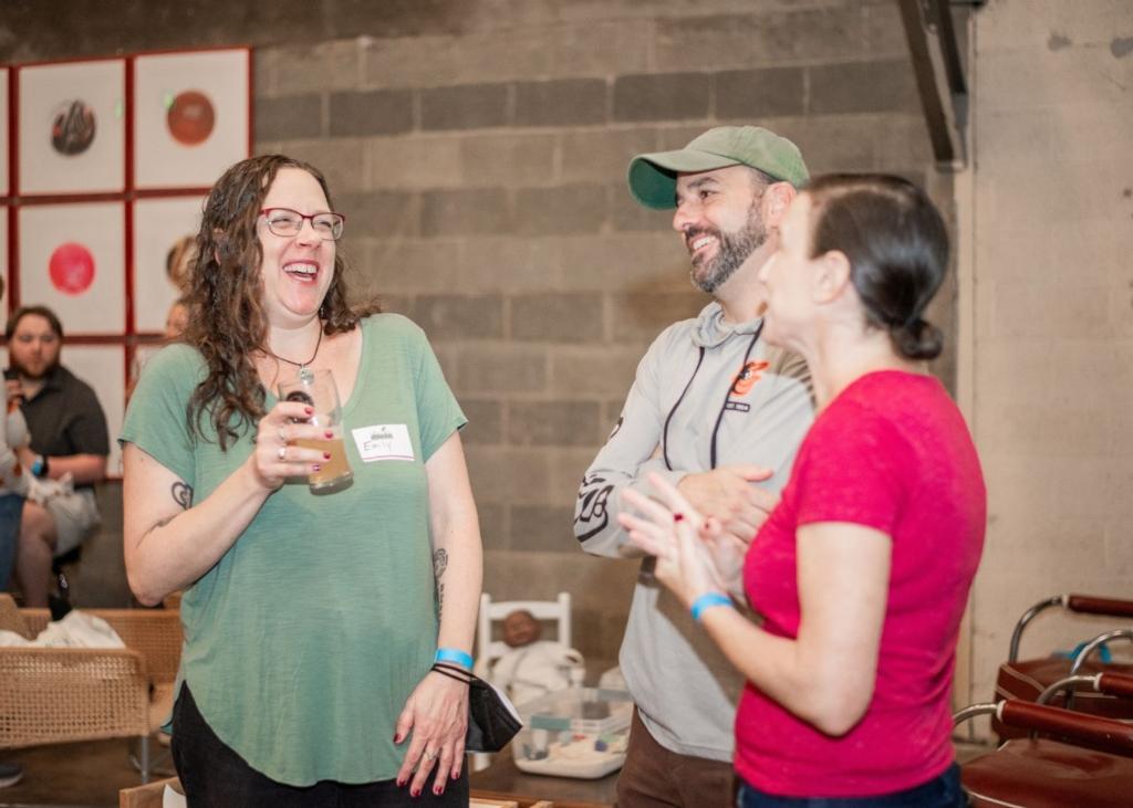 Owner, Emily Pelton, joined by previous doula clients enjoys our 10th birthday party at UNION craft brewing.