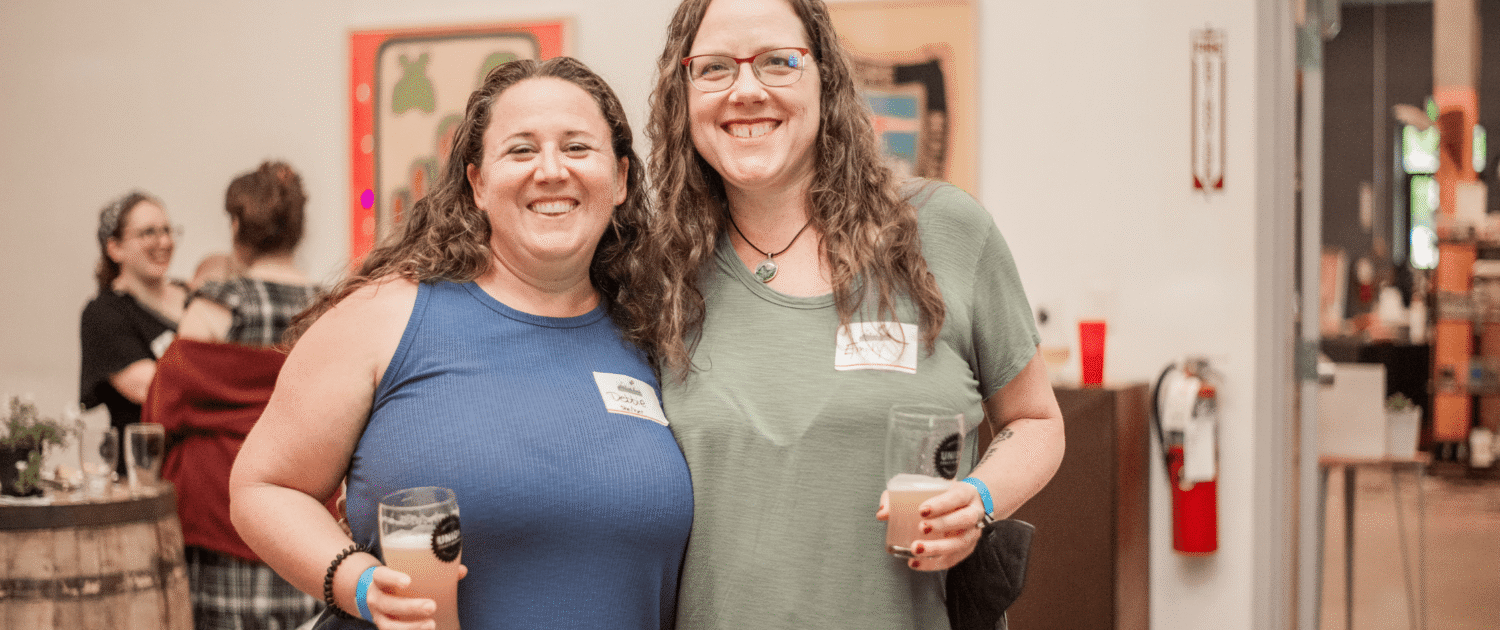 Emily Pelton and Debbie Bailey, owners of Doulas of Baltimore, enjoy a party in honor of their 10th Birthday.
