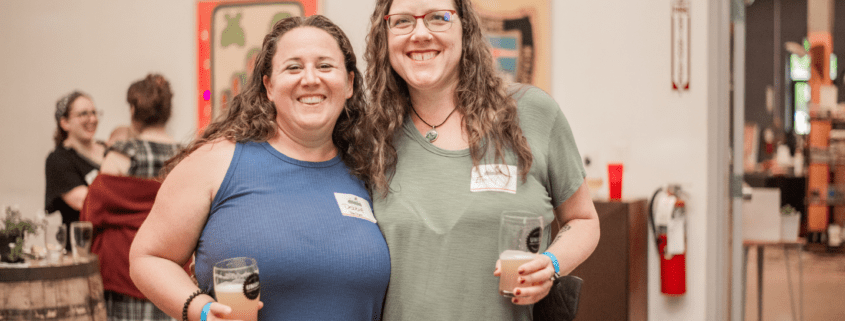 Emily Pelton and Debbie Bailey, owners of Doulas of Baltimore, enjoy a party in honor of their 10th Birthday.