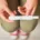 Hands hold a pregnancy test.